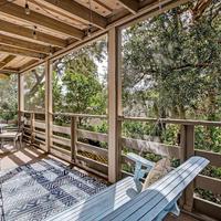 Secluded Condo with Peaceful Wooded Views and Easy Access to the Beach by RedAwning